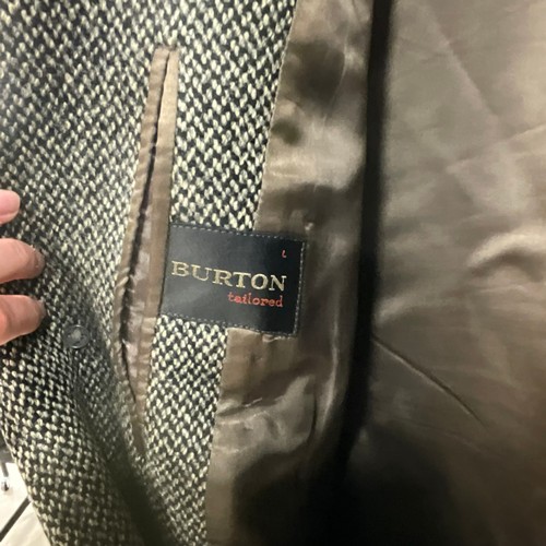 47 - A collection of men's coats, examples to include a Macintosh, Cordings of London, Burton, and a lamb... 