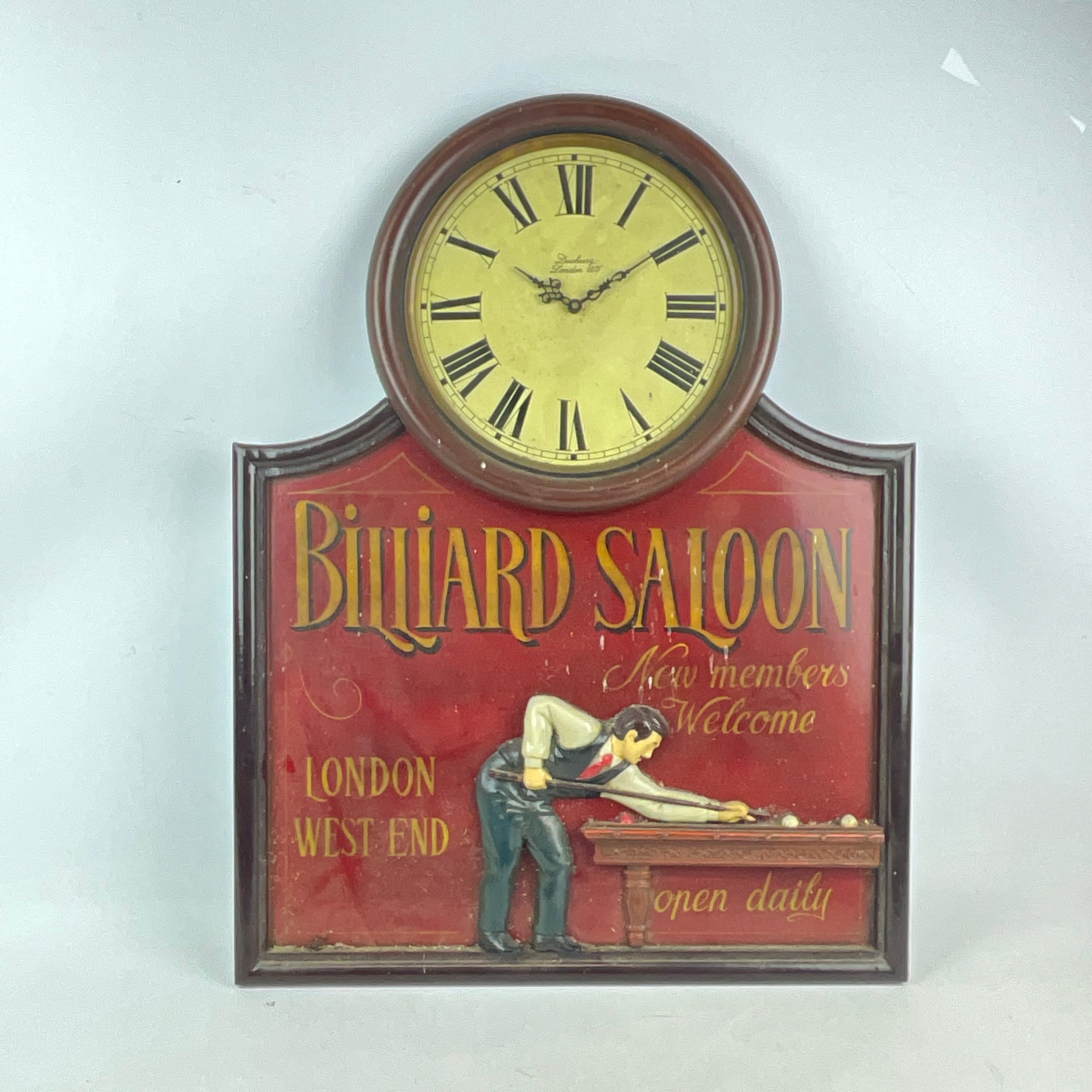 A decorative 'Billiard Saloon' wall clock, with plaque marked 'London ...