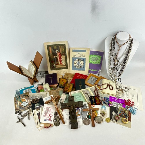 21 - A collection of religious items to include Holy Relic of St Pius X with Certificate of Authenticity,... 