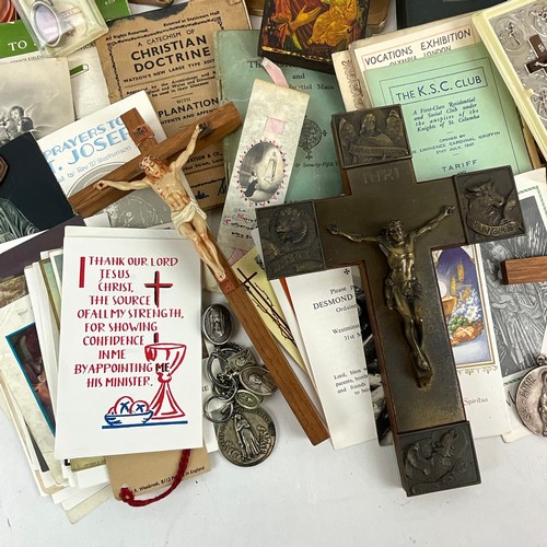 21 - A collection of religious items to include Holy Relic of St Pius X with Certificate of Authenticity,... 