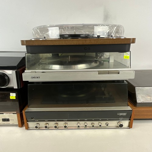 43 - Vintage electronic audio equipment, a group of five vintage turntables to include two Garrard exampl... 