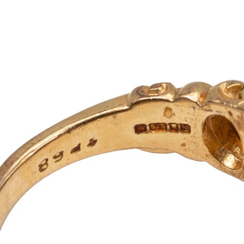 15 - A 9ct gold five stone opal ring, the opals of graduating oval form displaying a full range of colour... 
