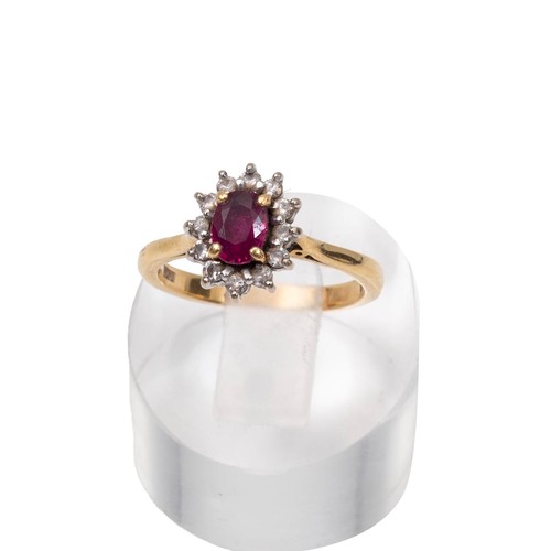 16 - 18ct gold ruby and diamond dress ring, the central ruby surrounded by border of diamonds, size M, we... 