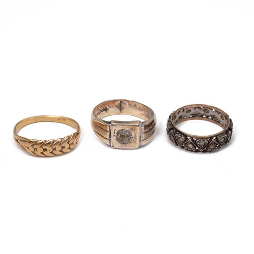 17 - A 9ct gold rope twist ring (marked 18ct), size T, weight 4.5 grams. Two include two gold on silver r... 