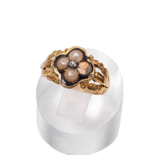 23 - An 18ct (tested) gold mourning ring set with four seed pearls (one missing) and a central rose cut d... 