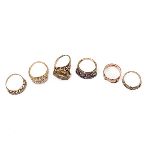 31 - A collection of five 9ct gold gem set rings, gross weight 19.9 grams. Including one in the form of a... 