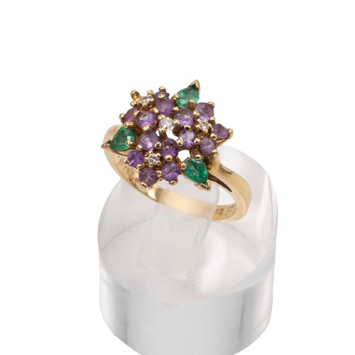 32 - An 18ct emerald, diamond and sapphire cluster ring set in 18ct gold, size P1/2, gross weight 5.7 gra... 