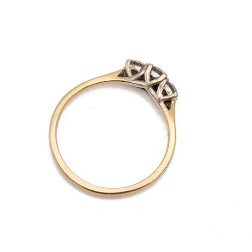 37 - 18ct gold hallmarked three stone diamond ring. The central brilliant cut diamond, approx 0.15ct, fla... 