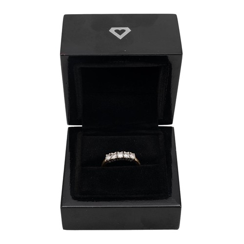 38 - An 18ct gold five-stone diamond ring, the brilliant cut diamonds weighing approximately 0.15 carats ... 