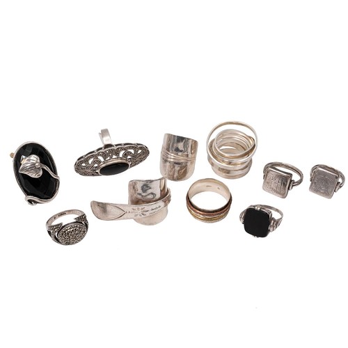43 - Collection of ten silver rings, including marcasite set examples, onyx examples and others, total we... 