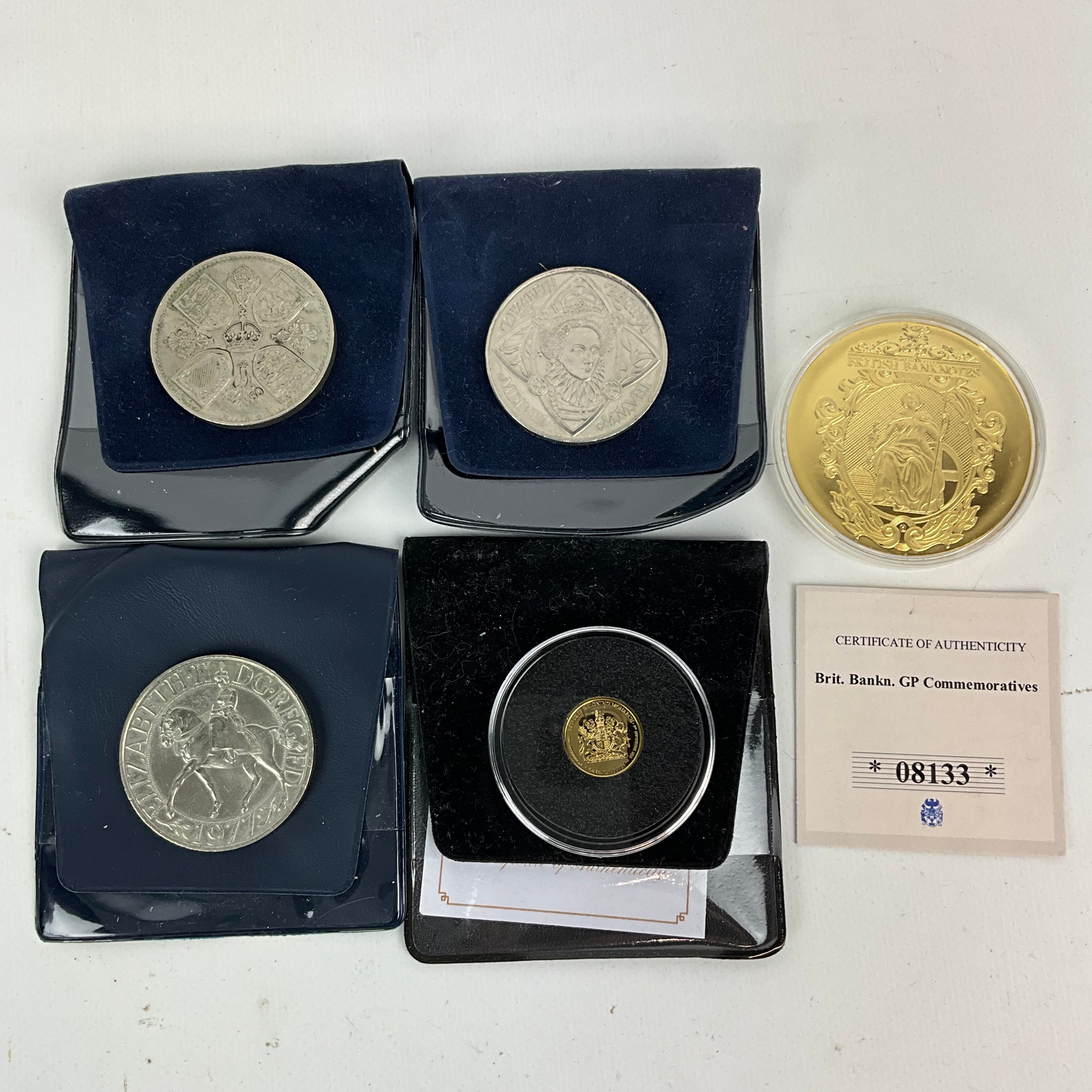 A collection of coins, including commemorative examples, a 9ct QE2, the ...