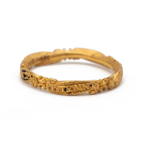 126 - A 20ct (tested) 18th-century mourning ring, the band with raised decoration bearing a name, date and... 