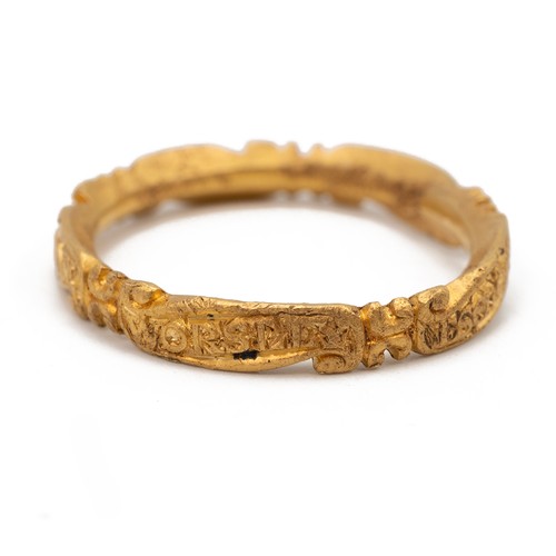 126 - A 20ct (tested) 18th-century mourning ring, the band with raised decoration bearing a name, date and... 