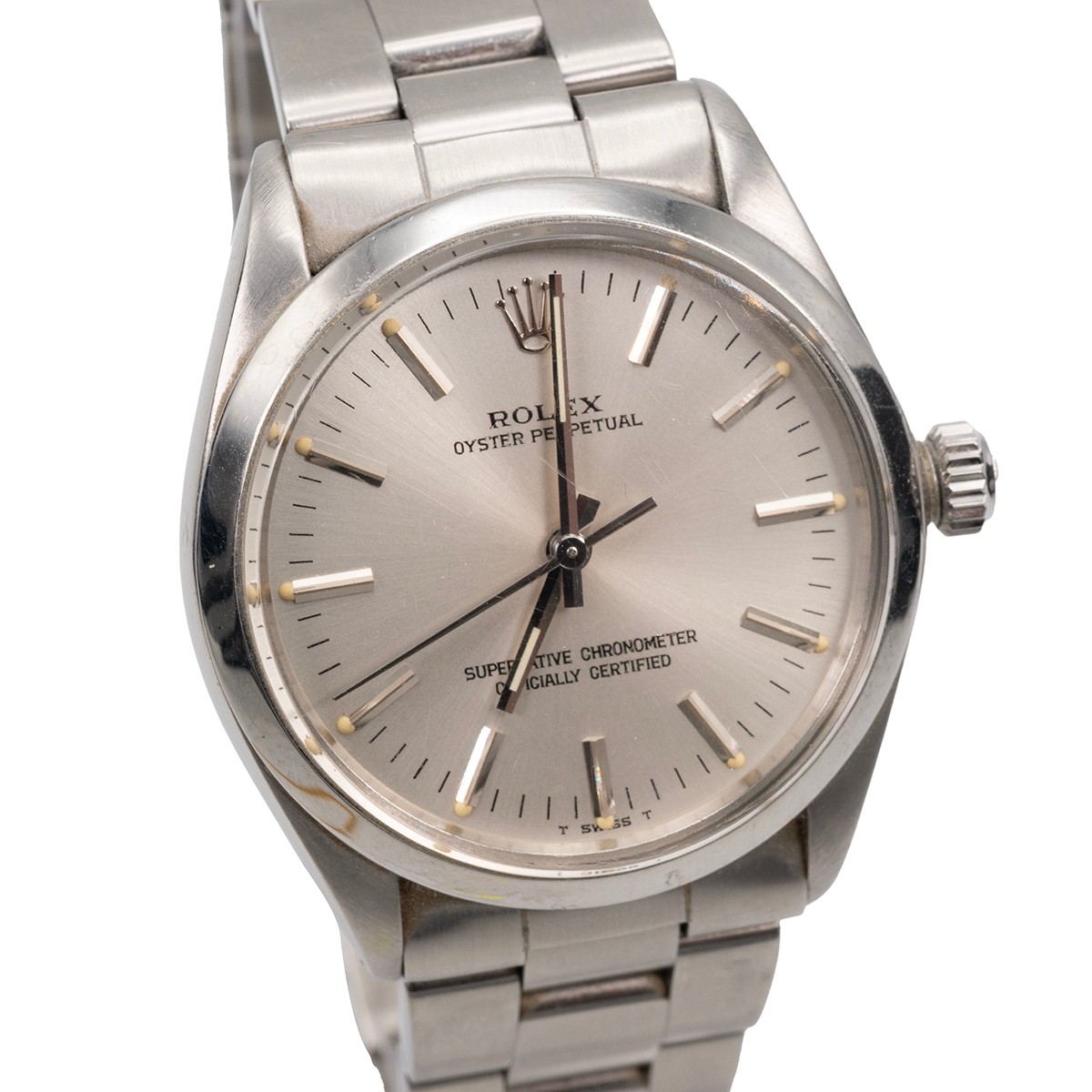 A Rolex Oyster Perpetual wristwatch with a silvered dial marked Rolex ...