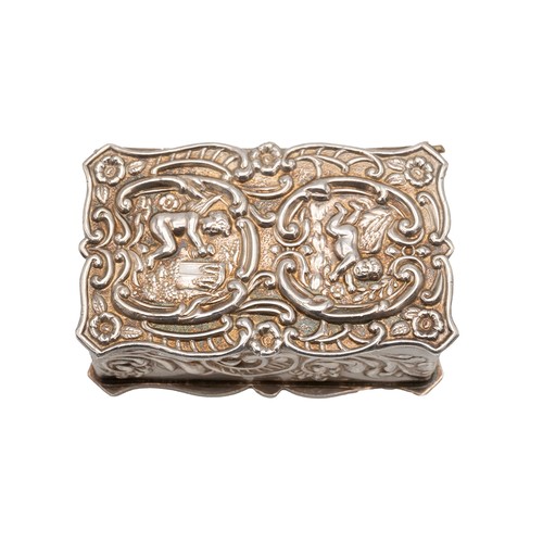 514 - A silver pill box decorated with acanthus flower decorations with two cherubs embossed to lid, hallm... 