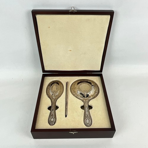 61 - An Adam-style modern vanity set, to include silver-backed mirror, brush and comb, maker's mark Richa... 