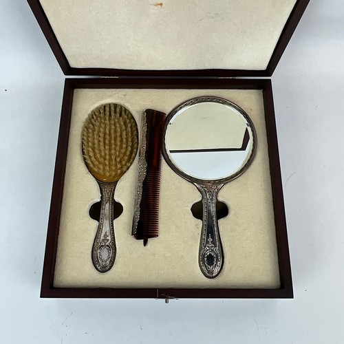 61 - An Adam-style modern vanity set, to include silver-backed mirror, brush and comb, maker's mark Richa... 