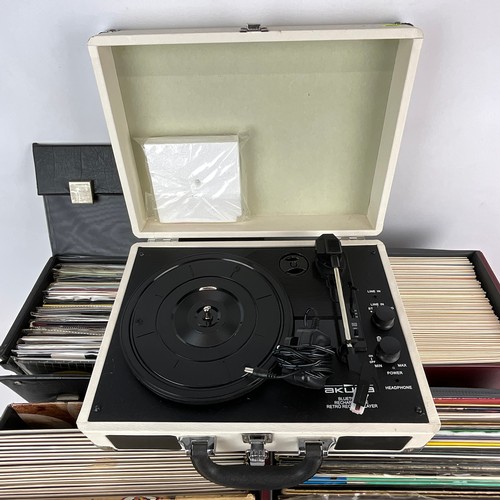 275 - A large collection of LPs and vinyl records, including Blondie, Wings, Pink Floyd, Elton John, The R... 
