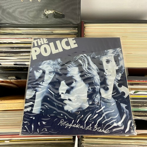 275 - A large collection of LPs and vinyl records, including Blondie, Wings, Pink Floyd, Elton John, The R... 