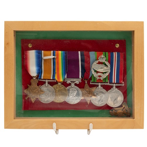 61 - A WWI and WWII medal group awarded to 3-9936 S.Burton of the Wiltshire Regiment to include the 1914-... 