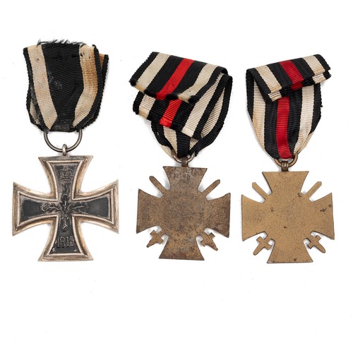 66 - A collection of WWI German medals to include an Iron Cross 2nd Class, and two Honour Cross's with sw... 