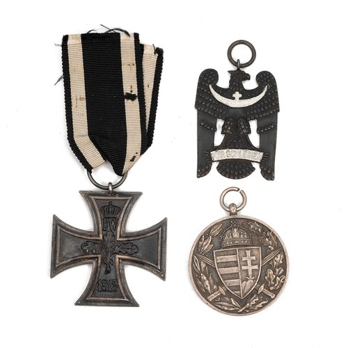 68 - A collection of WWI German medals to include an Iron Cross 2nd Class, a Hungarian Combatants medal a... 