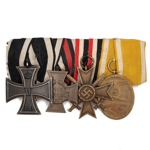69 - A collection of WWI and WWII German medals, to include a 1914 Iron Cross 2nd class, the Honour Cross... 