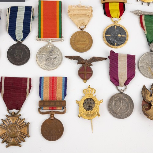 90 - A mixed collection of medals, to include various Polish Merit Medals, Dutch Resistance Medal, UN Med... 