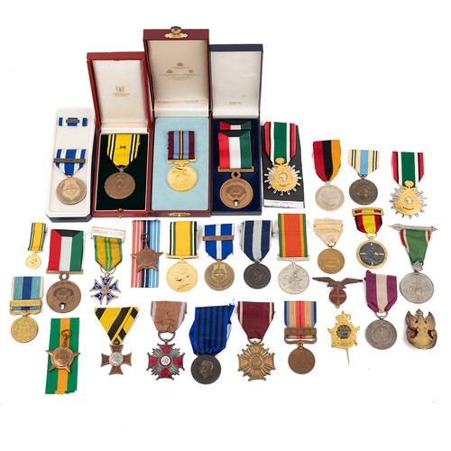 90 - A mixed collection of medals, to include various Polish Merit Medals, Dutch Resistance Medal, UN Med... 
