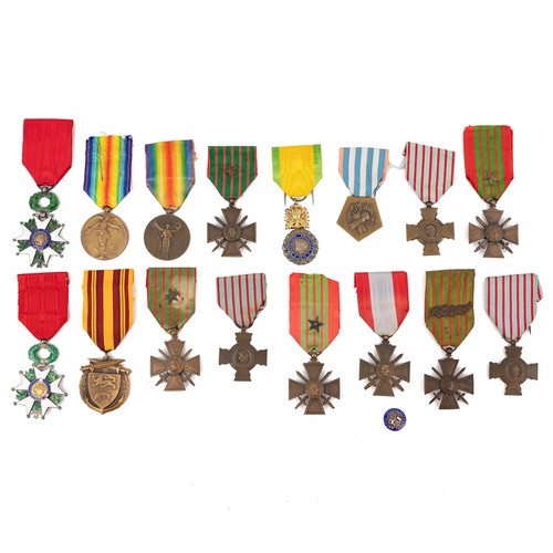 93 - A collection of French war medals to include the Combatant's Cross, the Legion of Honour Chevalier m... 