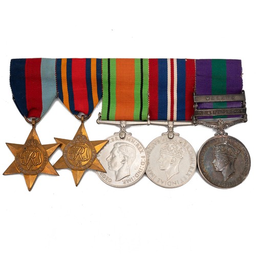 96 - A collection of WWII and later service medals, to include 1939-1945 Star, the Burma Star, the Defenc... 