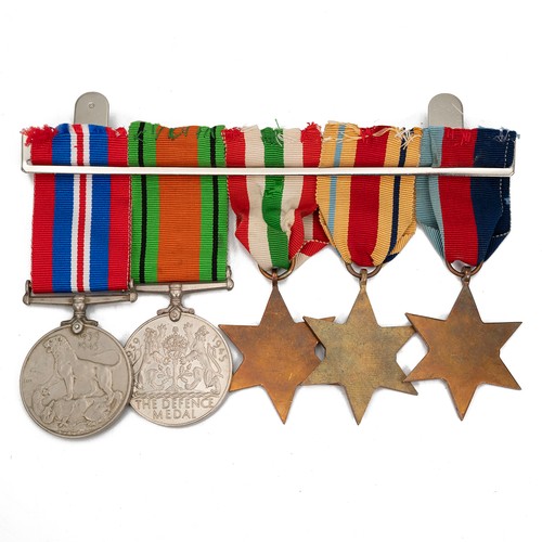 104 - WWII British medal group, to include 1939-1945 Star, Africa Star, Italy Star, the Defence Medal and ... 