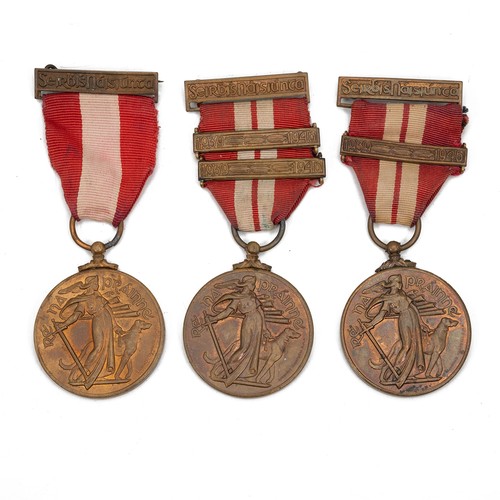 105 - A group of three 1939-1946 Irish Emergency Medals. One example with two bars, one example with one b... 