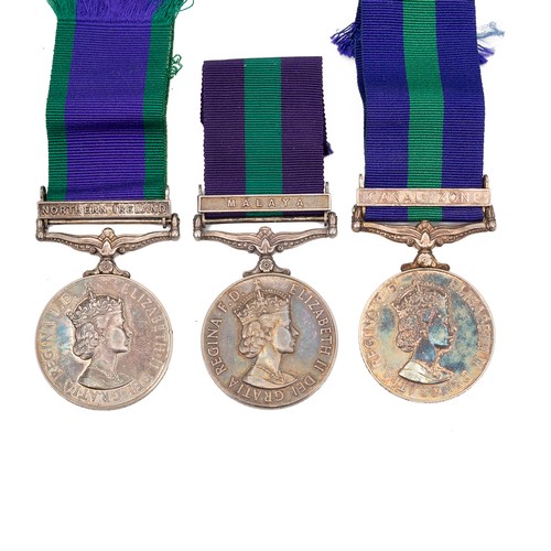 114 - A group of three Queen Elizabeth II campaign and service medals, to include a GSN with clasp to Mala... 