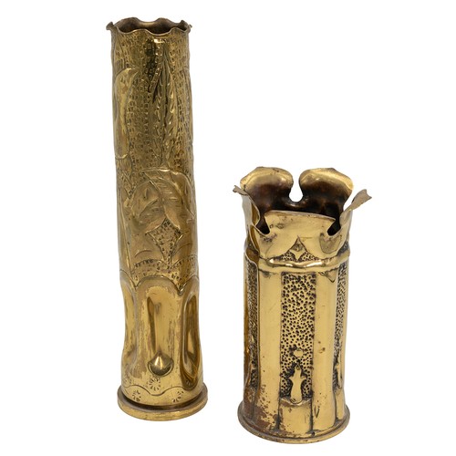 119 - A collection of five artillery shells with embossed and engraved foliate decorations, mixed makers a... 