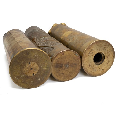 119 - A collection of five artillery shells with embossed and engraved foliate decorations, mixed makers a... 