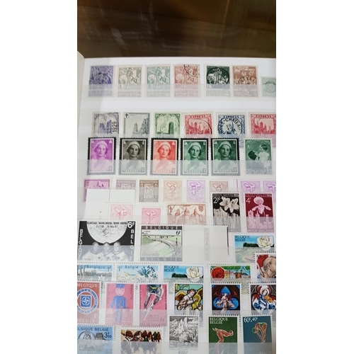 321 - STAMPS: Over 1400 Belgium and France unmounted Mint Stamps.