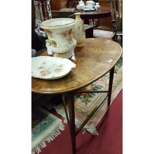 102 - An unusual 19th Century Mahogany oval Side Table with triangular base and flame grain top.