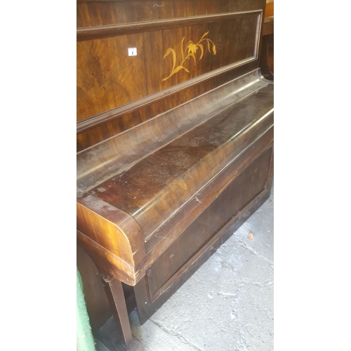 2 - An early 19th Century upright Piano.