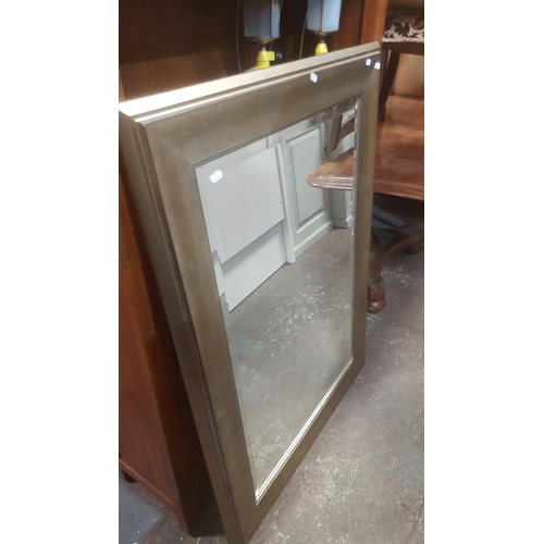 65 - A Hardwood Open Book Shelf with twin panel door base, along with a Silvered Bevelled edge Mirror.