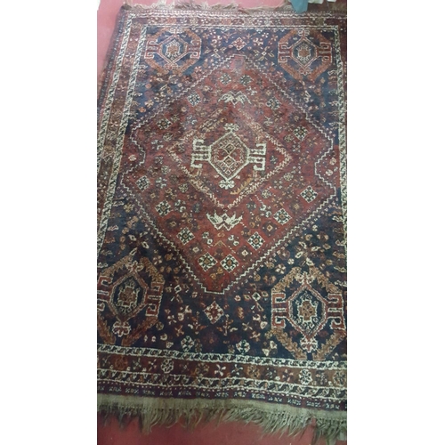 266a - An Eastern wool Rug 180 cm x 117 cm.