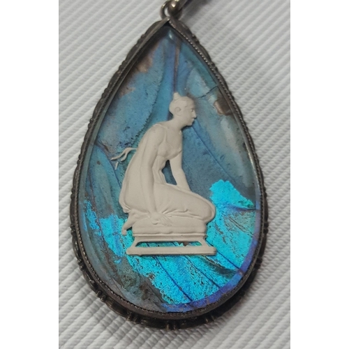 330 - A beautiful Cameo Pendant with Butterfly wings in background, stamped sterling silver.