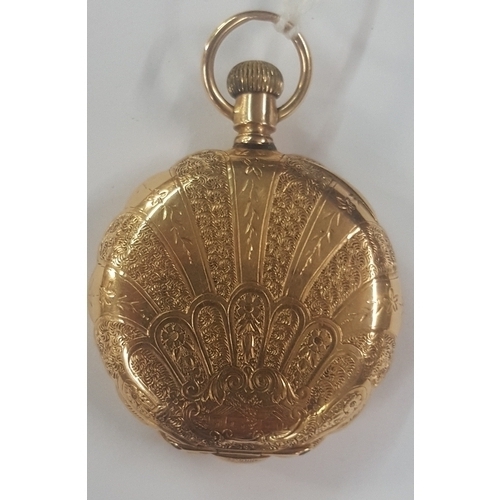 325a - A American Waltham pocket watch in a 14ct scalloped etched case.