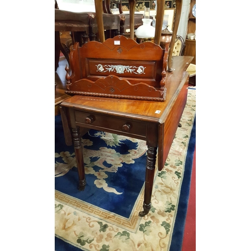 52 - A Georgian Mahogany Pembroke Table on turned supports.