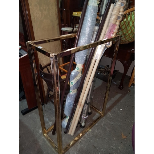 24 - A vintage open Bookshelves along with a large quantity of curtain poles some unused and new.