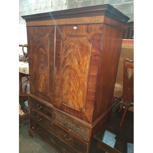 30 - A 19th century Mahogany Linen Press with hanging space circa 1830.