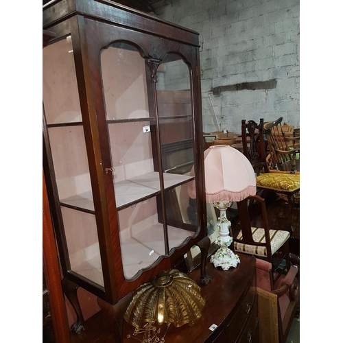 34 - An early 20th Century Mahogany Display Cabinet, a highly variegated table lamp, a dolls pram, a 1920... 