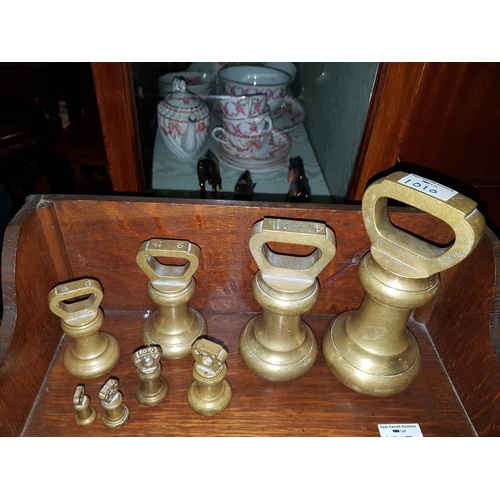 1010 - A Graduated Set of 19th Century Brass Weights.