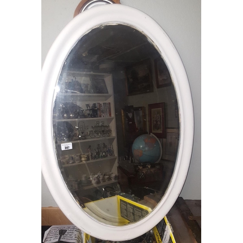 85 - A 19th Century Oval Painted wall Mirror with a Modern Mahogany Torchere Stand.