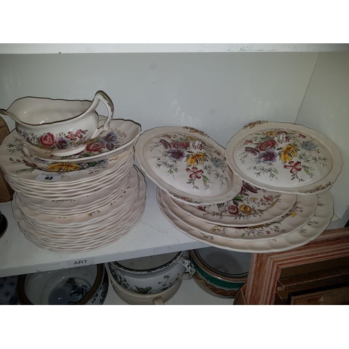 63 - A large quantity of 'Sheraton' pattern Johnson Brothers Dinnerwares.